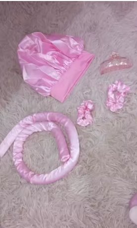 Customer photo: the full satin curl kit with the bonnet, scrunchies and claw clip