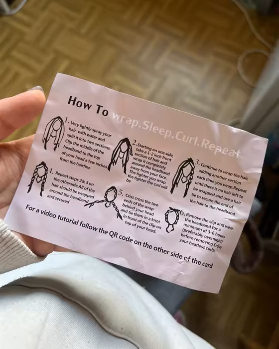Customer photo: the illustrated how-to card that comes in the box, held in one hand